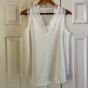 Flowy white top with eyelash lace trim